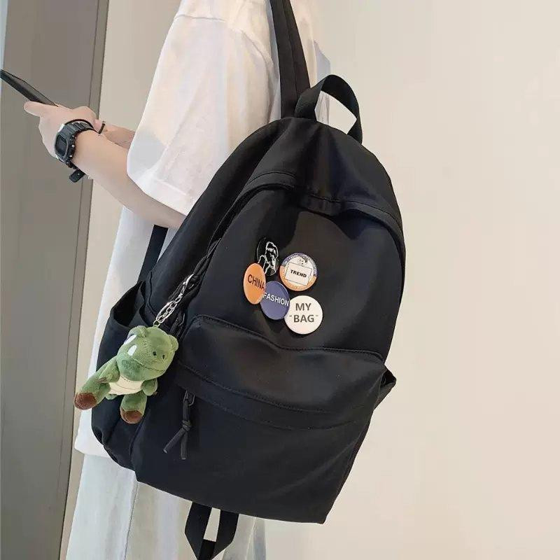Backpack men's large -capacity travel backpack female leisure Japanese boys junior high school students high school coll